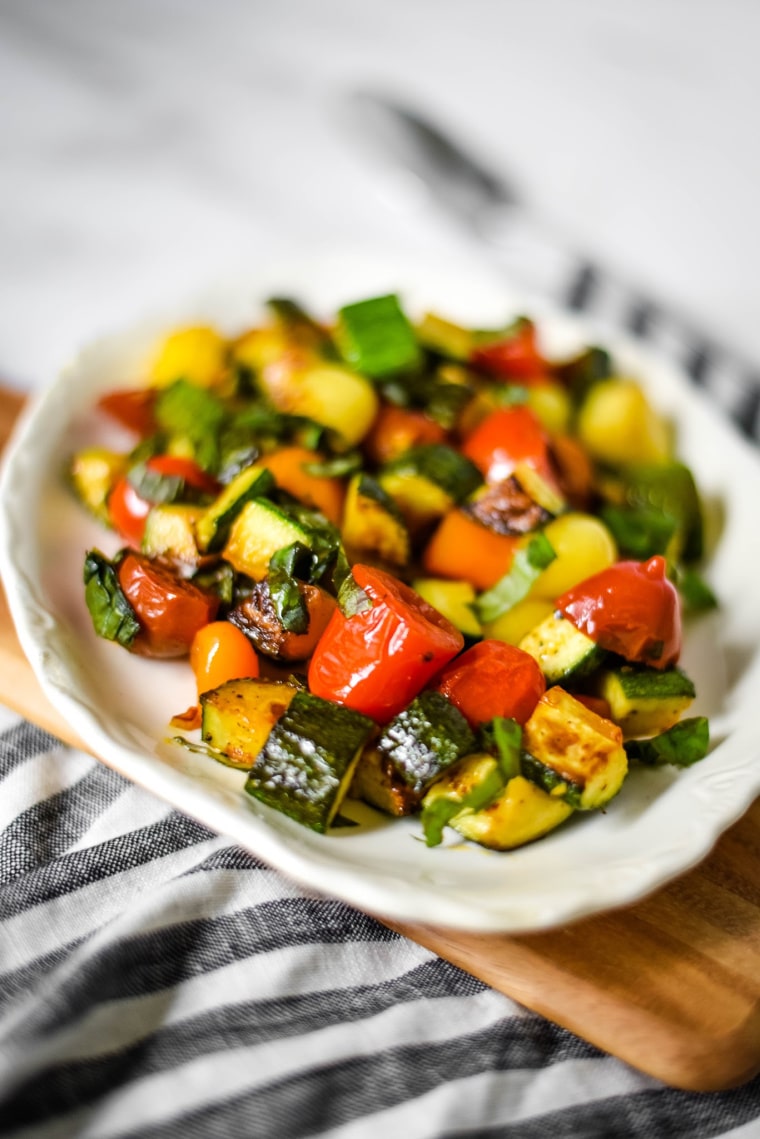 zucchini trifolati on white platter