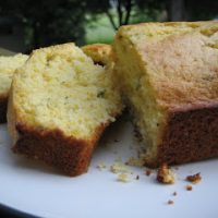 lemon thyme cornbread loaf with slices taken out