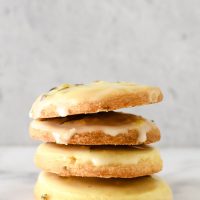 four lemon lavender cookies stacked on top of each other