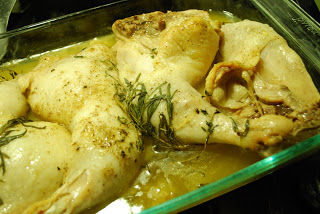 chicken confit in a pan 
