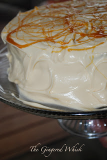 butter beer cake with caramel swirls on top