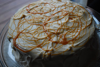 view of butter beer cake with caramel swirls on top