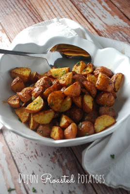 white bowl with dijon roasted potatoes 