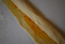 rolling up povitica dough 