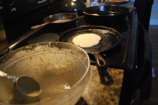 griddles on stovetop cooking pancakes