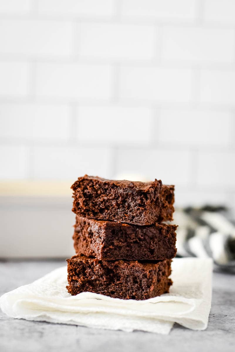 three sourdough brownies stacked on top of each other