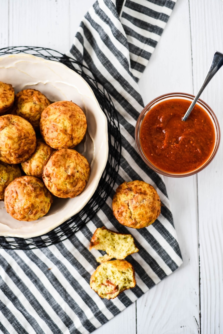 baked mini pizza bites in bowl with marina sauce 