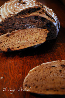 loaf of chocolate bread on wooden table