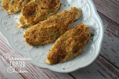 parmesan crusted chicken on white platter