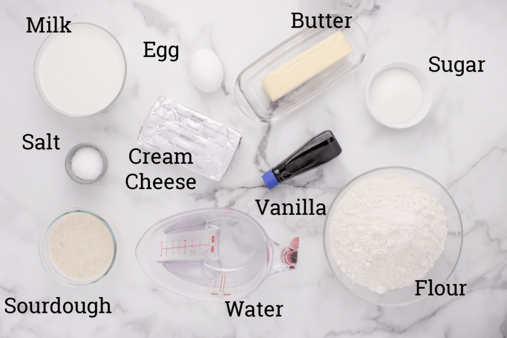 ingredients for sourdough danish pastries on marble counter with text overlay