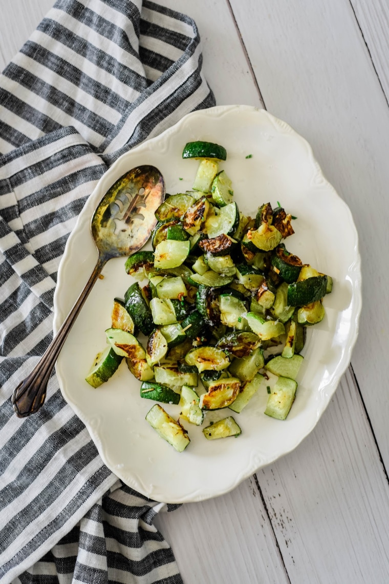 roasted zucchini on white serving platter