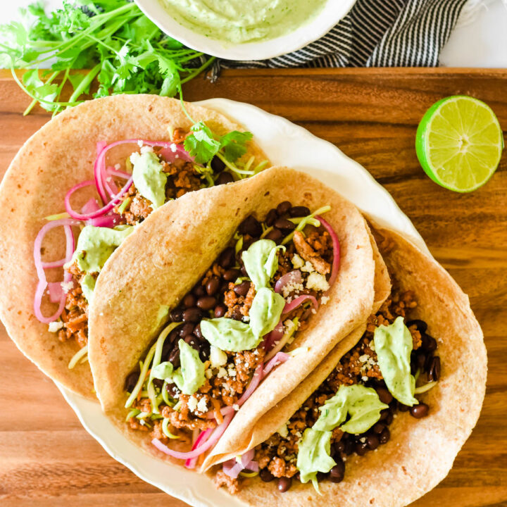 tacos with ground pork and avocado sauce