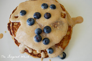 overhead view of sweet potato pancakes with blueberries on top