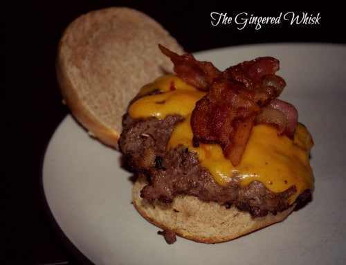 venison burger with bacon and cheese on bun