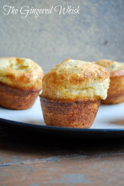 popovers with nutmeg and pepper on plate