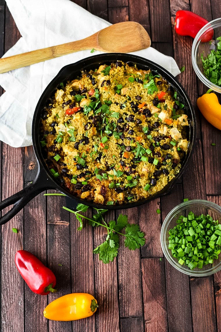 Thai Quinoa Casserole in cast iron skillet with peppers 