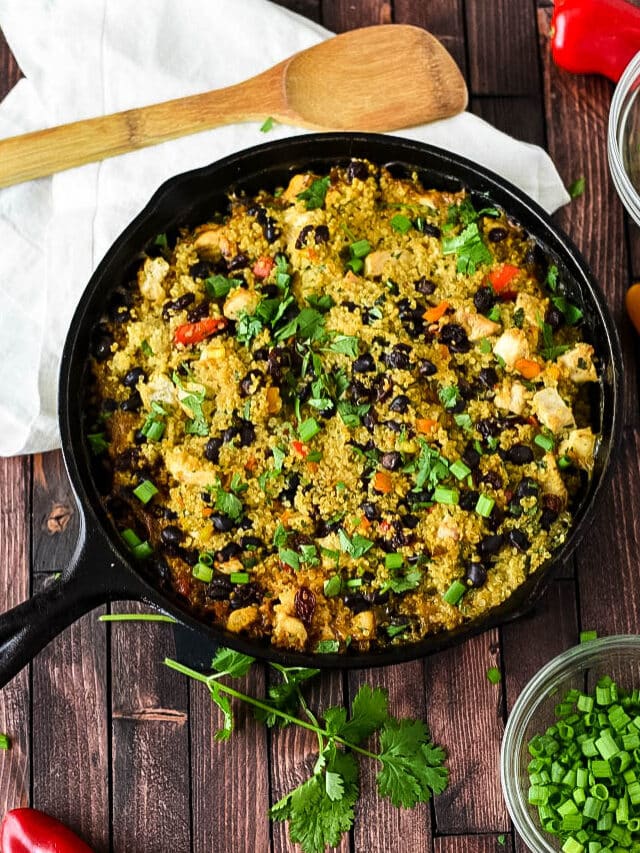 Thai Quinoa Casserole in cast iron skillet with peppers