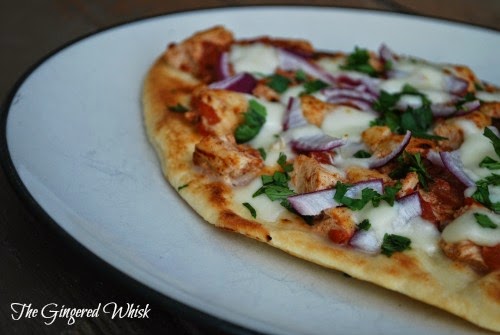 chicken tikka pizza on plate