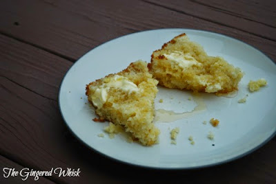sourdough cornbread on plate with butter and honey