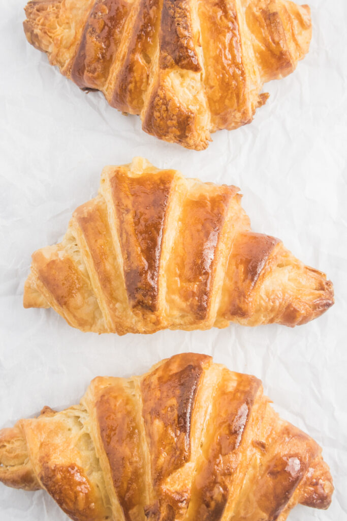 three croissants in a vertical row