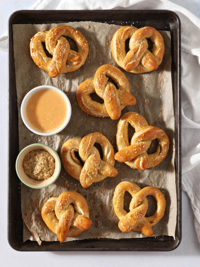 sourdough pretzels on tray with mustard beside