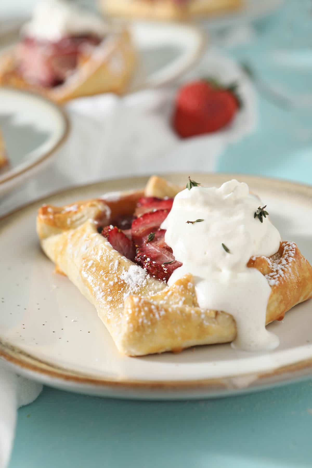 strawberry galette with whipped cream on top