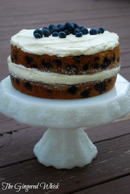 cake stand with blueberry cake