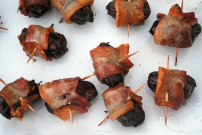 close up image of bacon wrapped dates