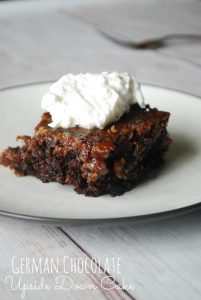 german chocolate cake with whipped cream on white plate