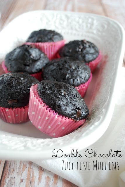 white serving bowl with six chocolate zucchini muffins