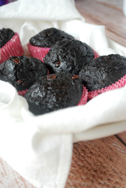 chocolate muffins wrapped in white towel