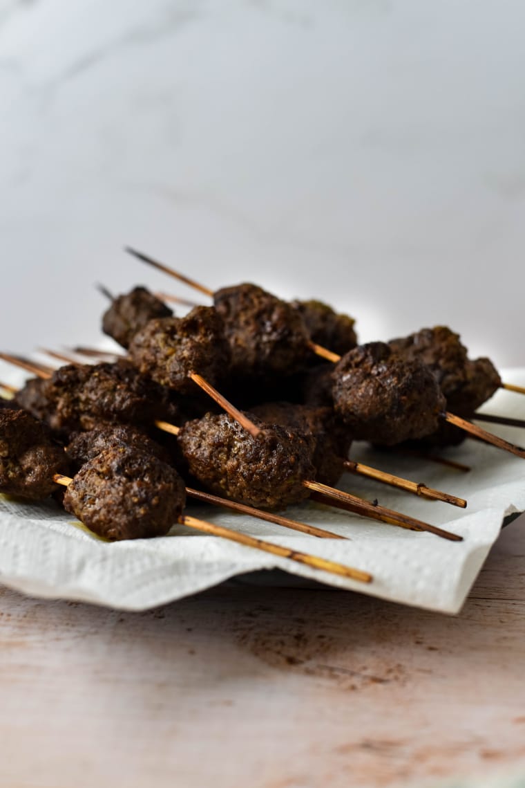 beef kofta on wooden skewers