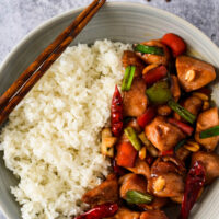 kung pao chicken in bowl with rice