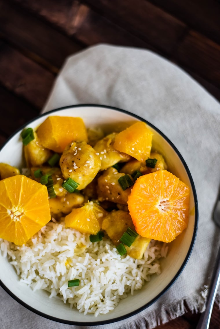 bowl with rice and orange chicken