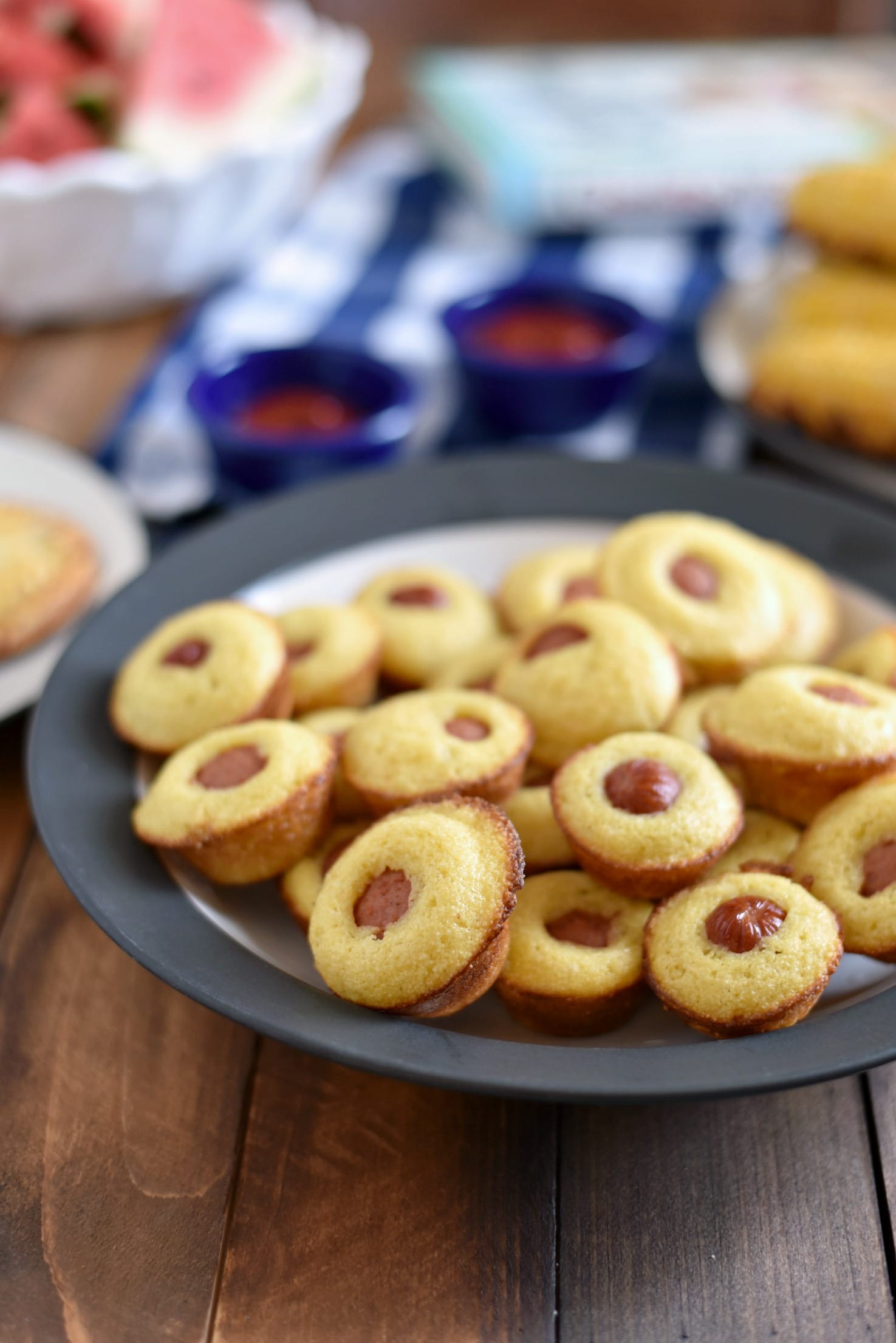 A plate of corn dog muffins 