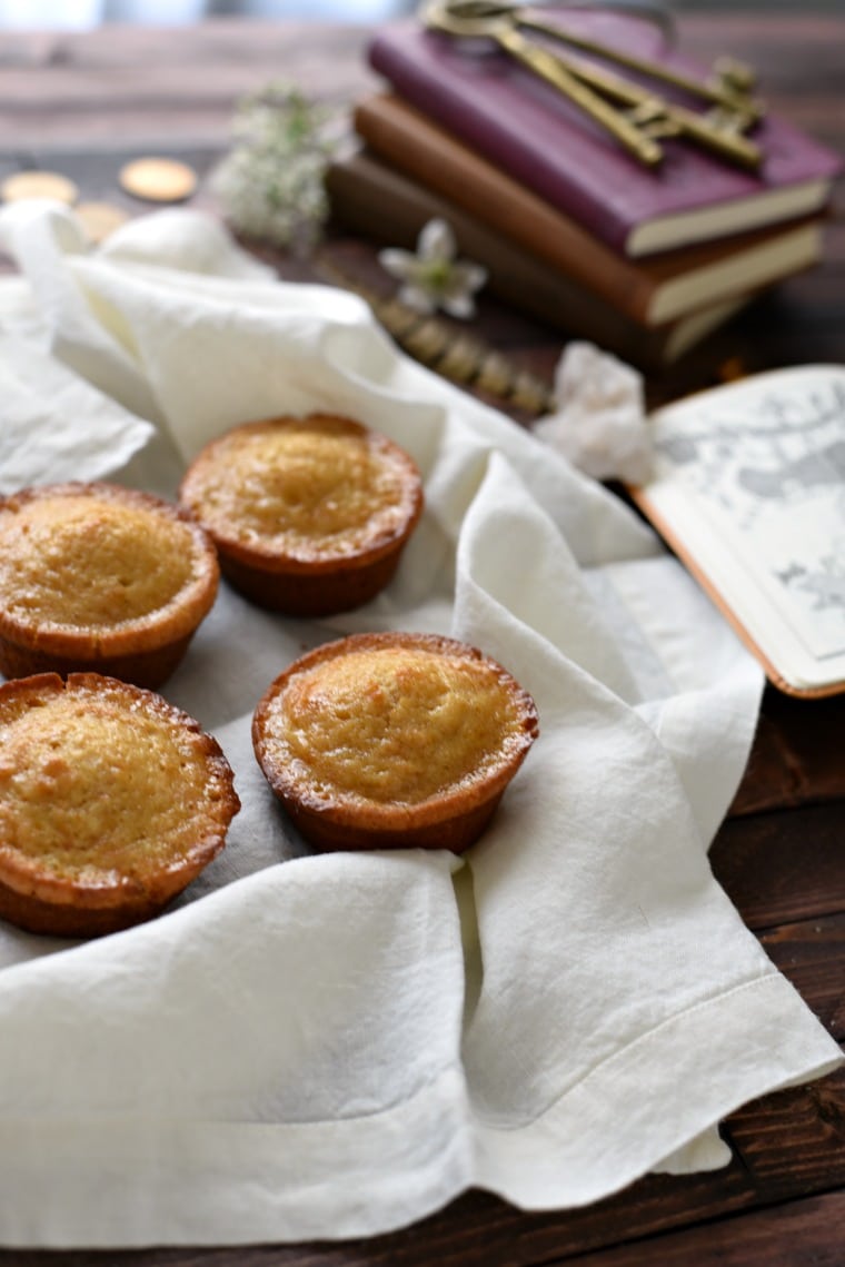 A white towel with four honey cakes on top