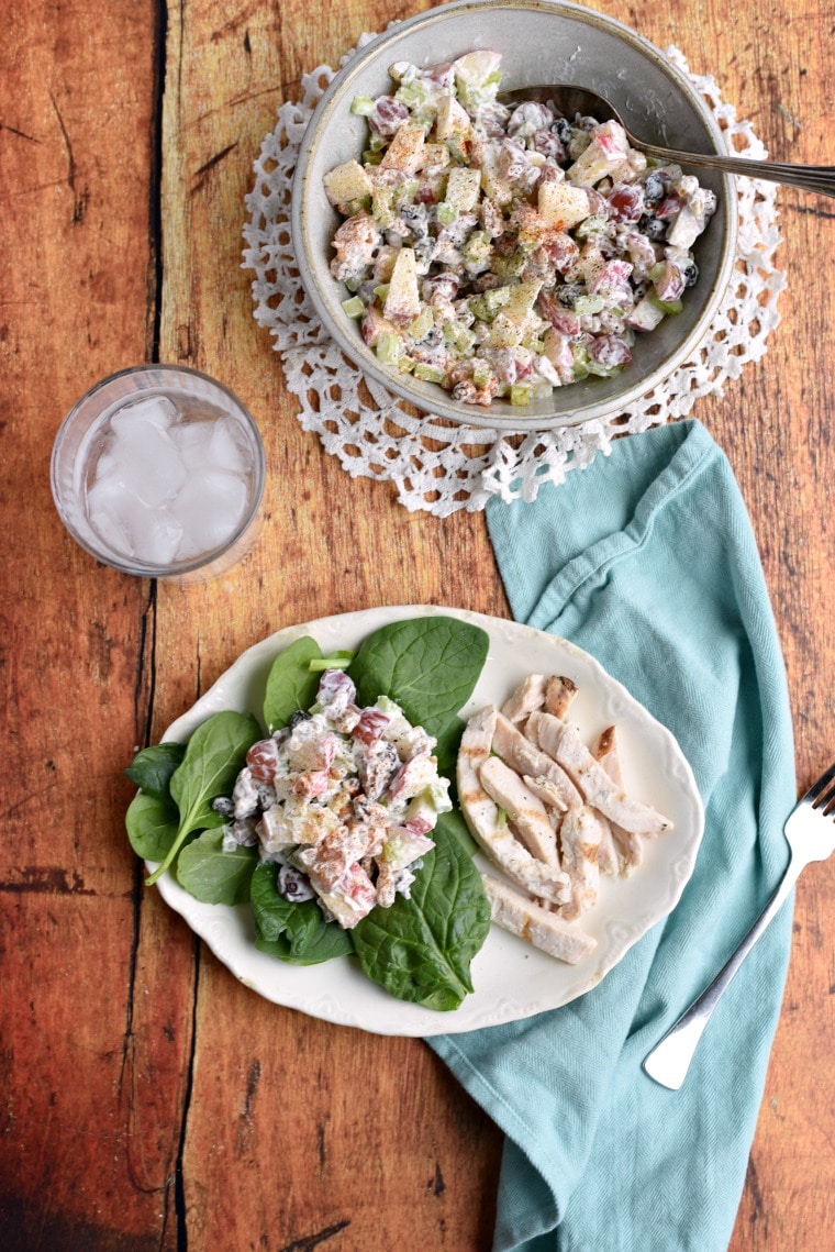 waldorf salad in serving bowl and on plate with lettuce