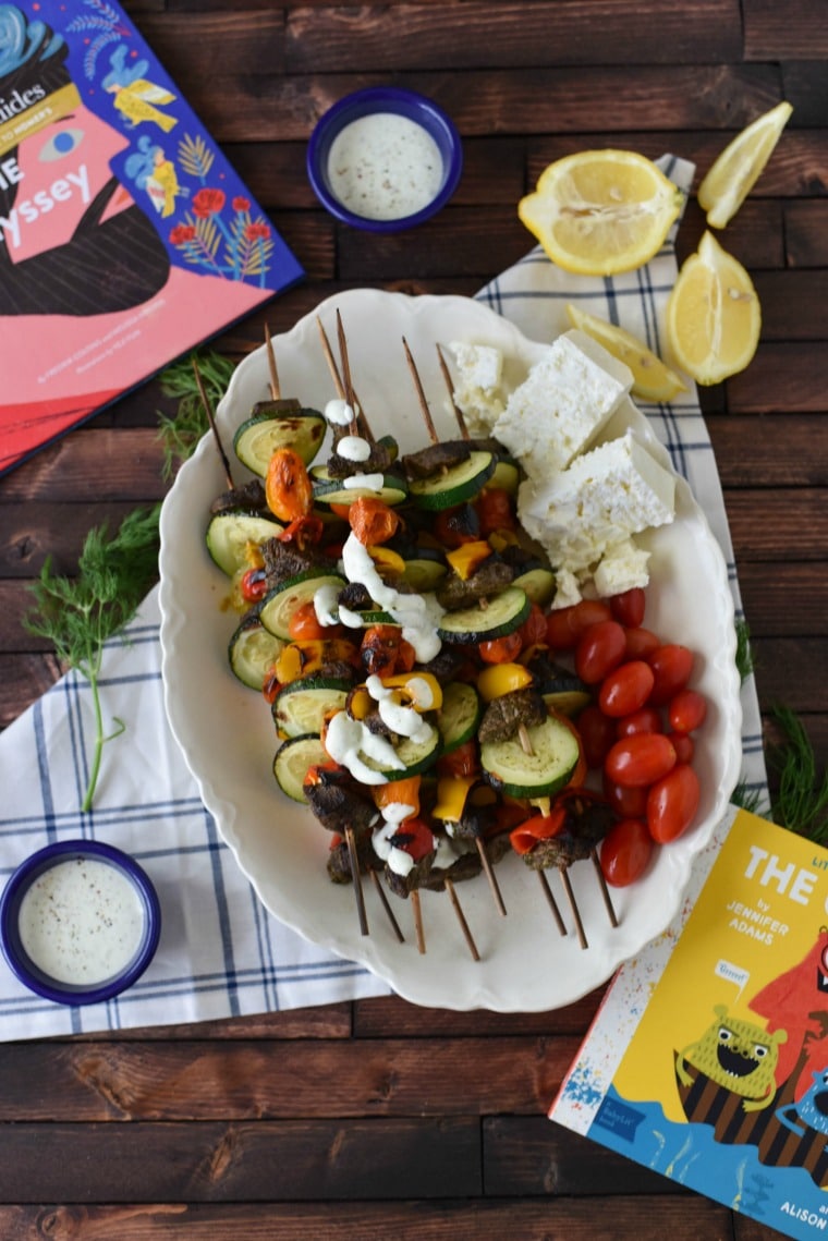 Greek Beef Kebabs next to books of The Odyssey