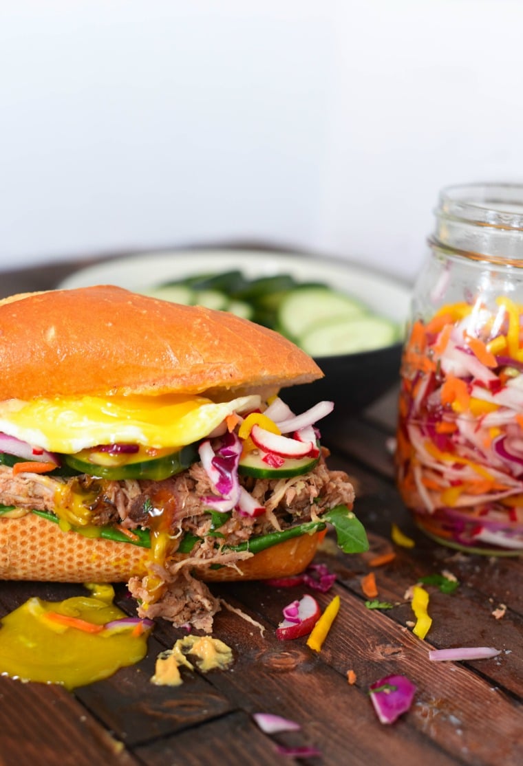 Bahn Mi with Runny Egg and Pickled Slaw in Background