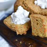 Slices of Carrot Cake with Whipped Cream