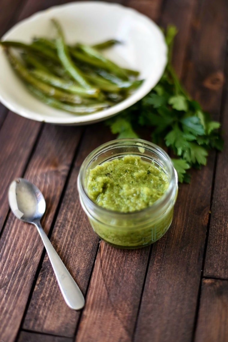 green bean baby food in jar with spoon