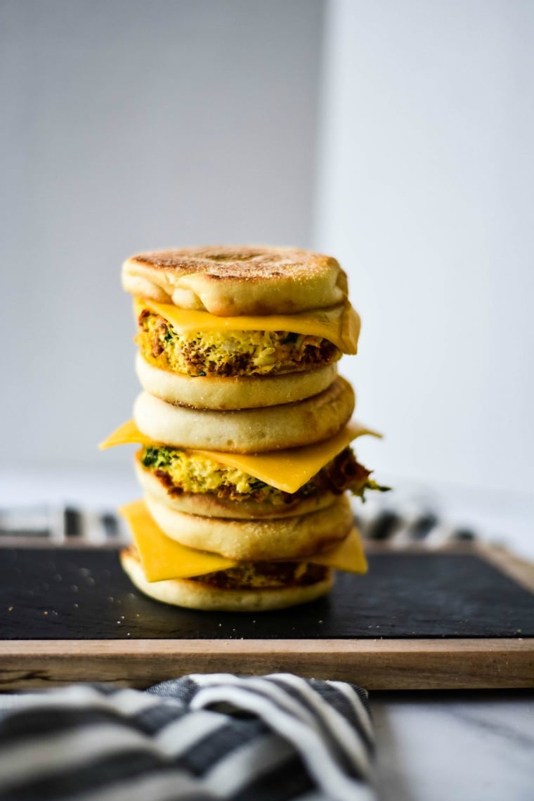 3 breakfast freezer sandwiches stacked on top of each other