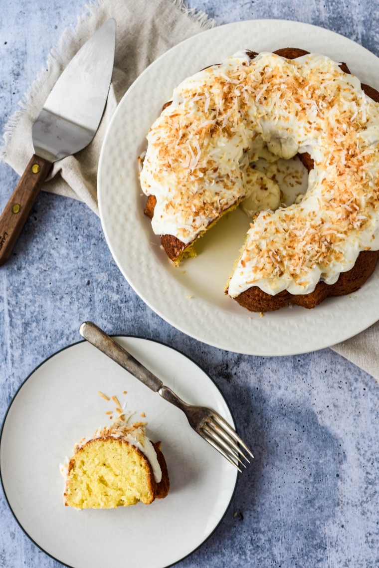 coconut bundt cake with slice taken out