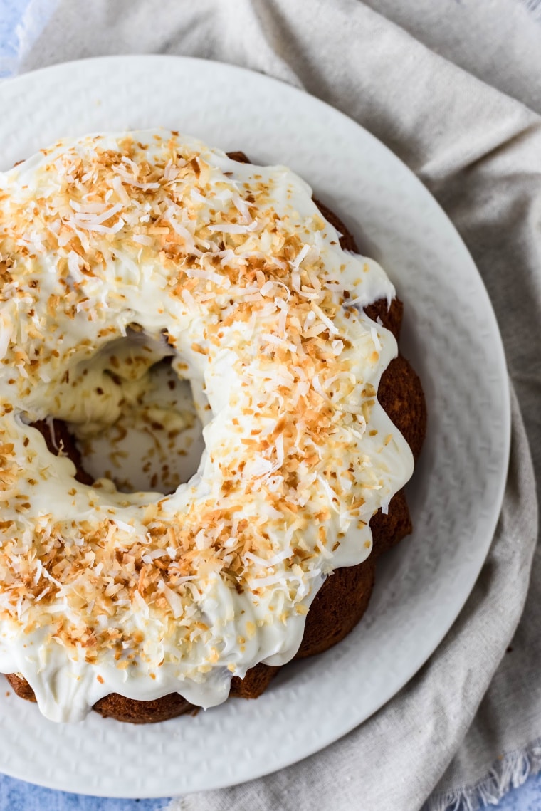 top down view of coconut bundt cake with toasted coconut on top