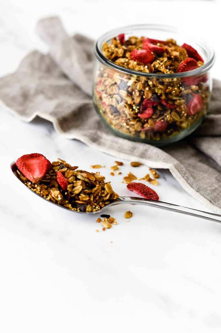 homemade granola in jar with spoon