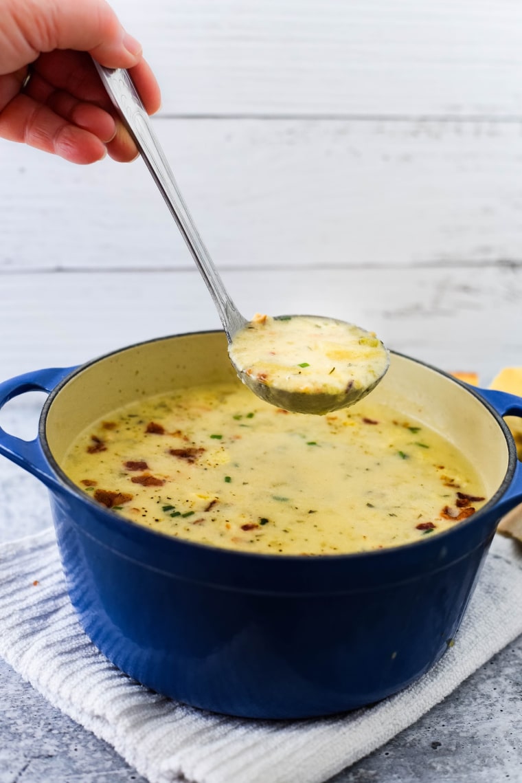 potato soup being labeled out of bowl