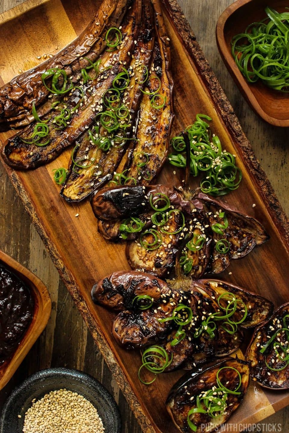 garlic roasted eggplant on wooden tray