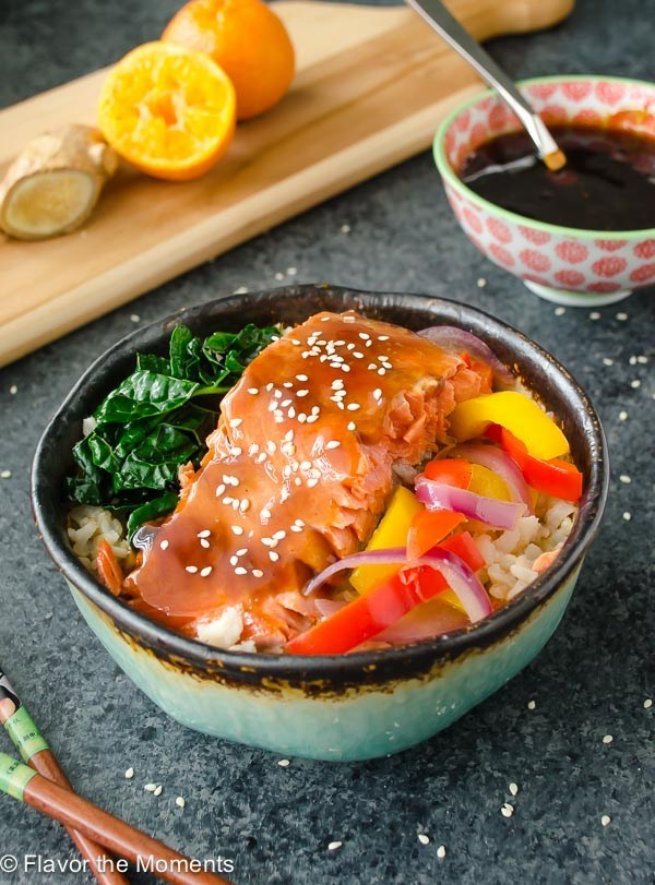 asian flavored salmon in bowl with veggies and rice