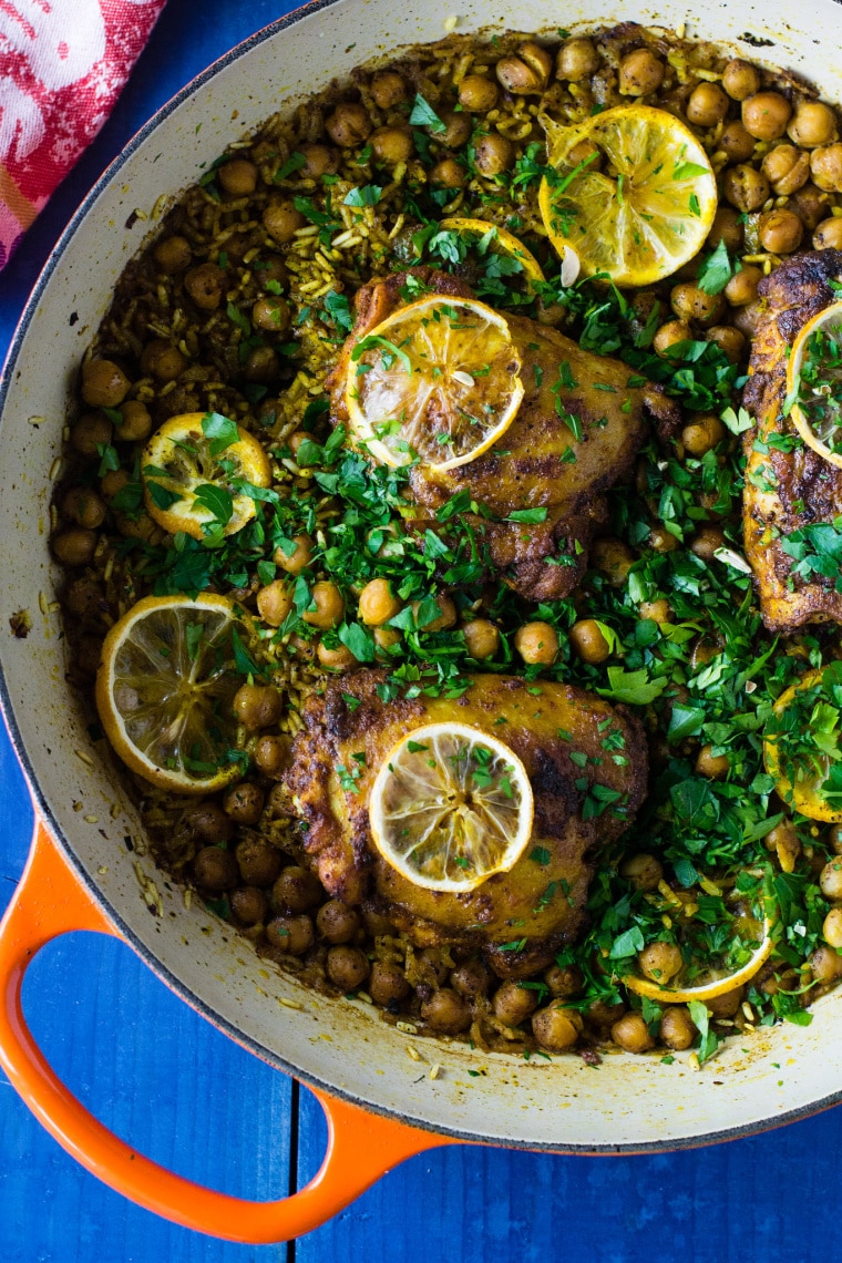 cooking pot with chicken and chickpeas with lemon