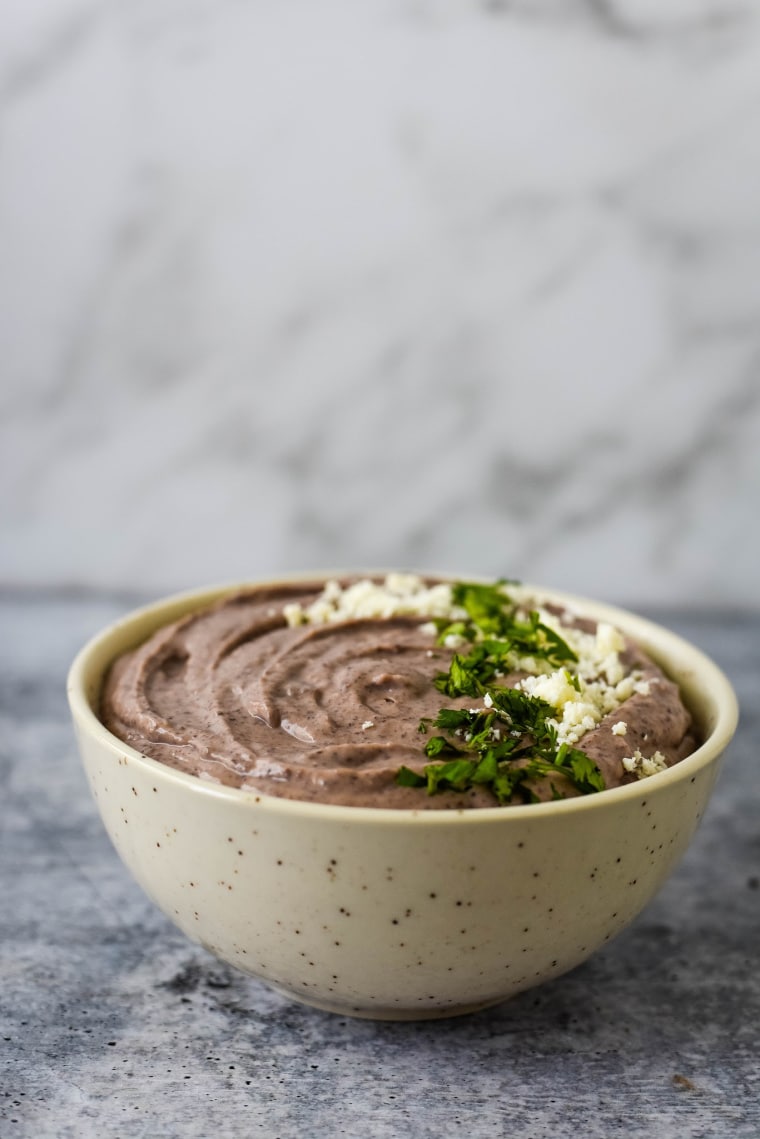 black bean dip in white bowl 